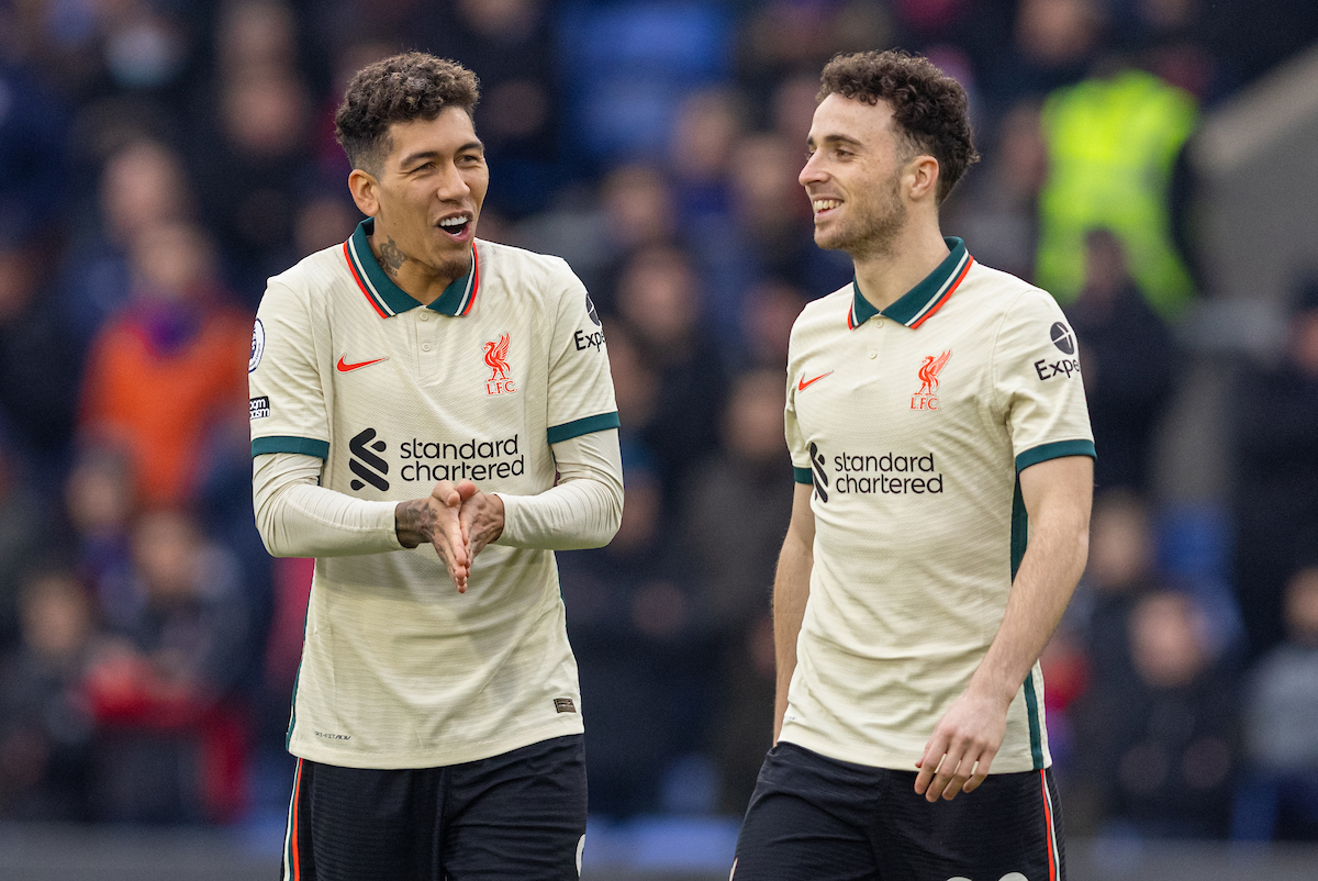 Liverpool's Roberto Firmino (L) and Diogo Jota during the FA Premier League match between Crystal Palace FC and Liverpool FC at Selhurst Park