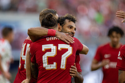 Liverpool's Darwin Núñez (L) celebrates with team-mate Mohamed Salah (R) after scoring the second goal during a pre-season friendly match between RB Leipzig and Liverpool FC at the Red Bull Arena