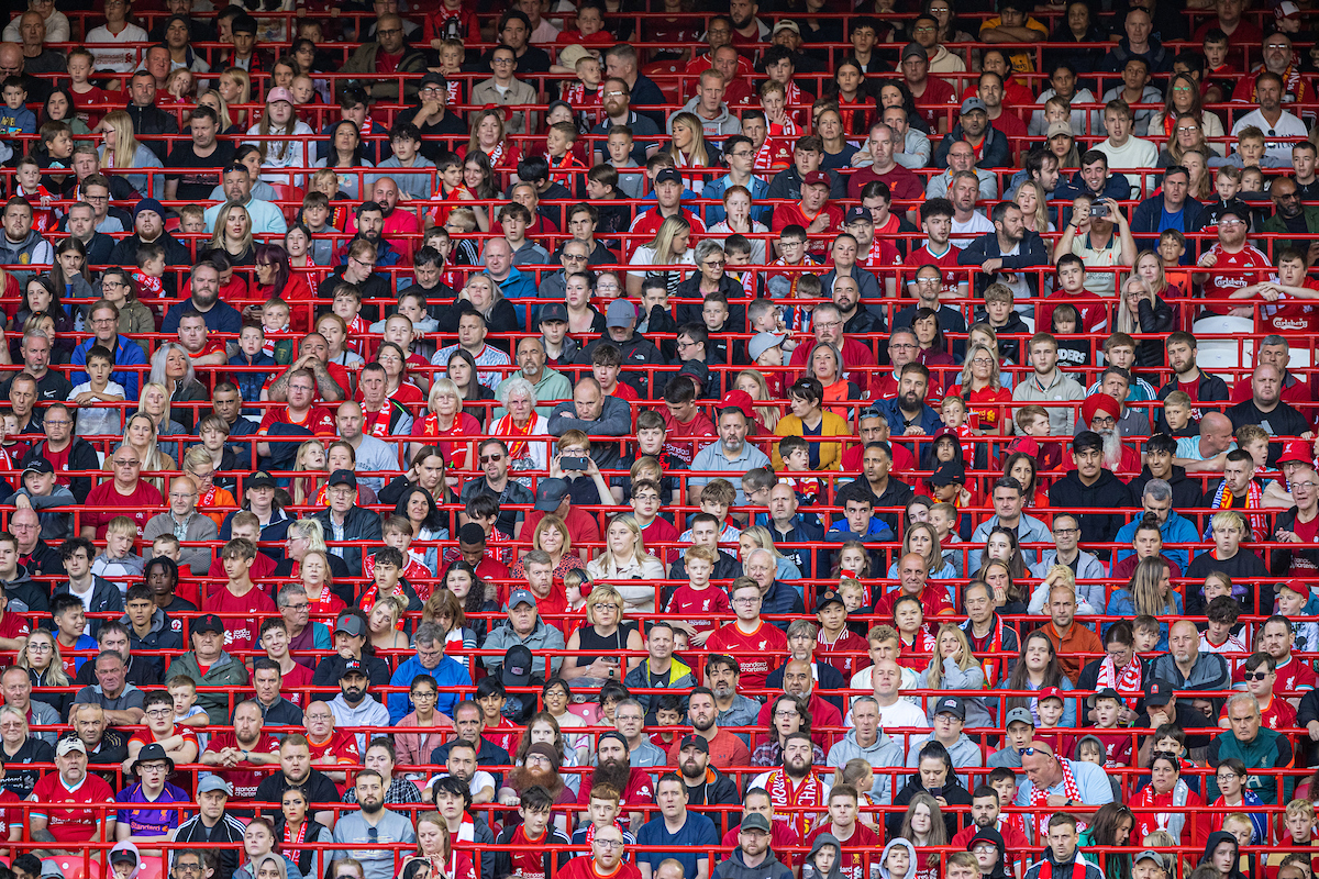 Liverpool supporters in rail seats during a pre-season friendly match between Liverpool FC and RC Strasbourg Alsace at Anfield