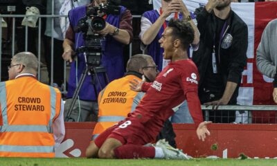 Liverpool's Fábio Carvalho celebrates after scoring the winning second goal in the 95th minute of injury time during the FA Premier League match between Liverpool FC and Newcastle United FC at Anfield