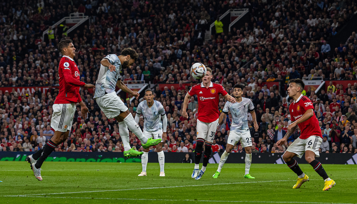 Liverpool's Mohamed Salah scores his side's first goal with a header during the FA Premier League match between Manchester United FC and Liverpool FC at Old Trafford