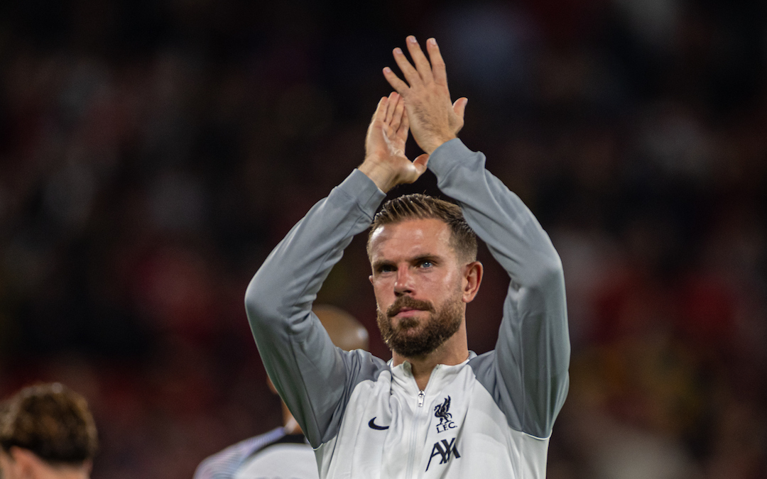 Liverpool's captain Jordan Henderson applauds the supporters after the FA Premier League match between Manchester United FC and Liverpool FC at Old Trafford