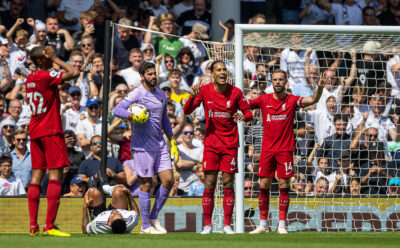 Liverpool's goalkeeper Alisson Becker (L), Virgil van Dijk (C) and captain Jordan Henderson (R) react after Fulham are awarded a penalty during the FA Premier League match between Fulham FC and Liverpool FC at Craven Cottage
