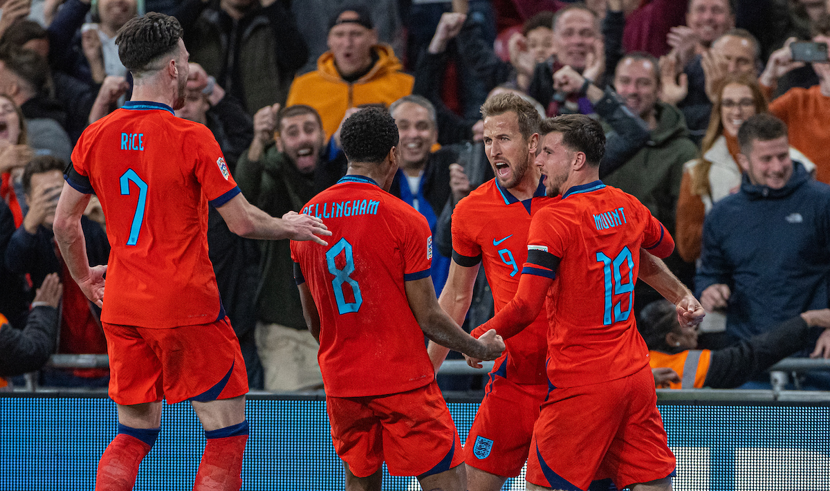 England's captain Harry Kane (C) celebrates with team-mates after scoring the third goal during the UEFA Nations League Group A3 game between England and Germany at Wembley Stadium