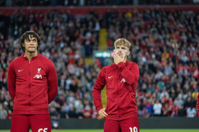 Liverpool's Trent Alexander-Arnold and Harvey Elliott line-up before the UEFA Champions League Group A matchday 2 game between Liverpool FC and AFC Ajax at Anfield