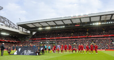Liverpool players line-up with a "No Room For Racism" banner during the FA Premier League match between Liverpool FC and Manchester City FC at Anfield