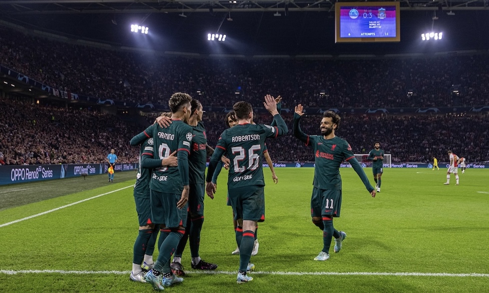 Liverpool's Harvey Elliott (hidden) celebrates with team-mates after scoring the third goal during the UEFA Champions League Group A matchday 5 game between AFC Ajax and Liverpool FC at the Amsterdam Arena