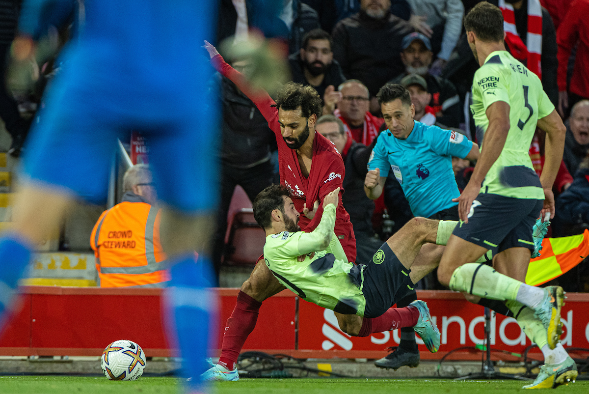 Liverpool's Mohamed Salah is pulled down by Manchester City's Bernardo Silva, but no free-kick was awarded, leading to an incensed manager Jürgen Klopp being sent off, during the FA Premier League match between Liverpool FC and Manchester City FC at Anfield