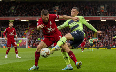 Liverpool's James Milner (L) and Manchester City's Phil Foden during the FA Premier League match between Liverpool FC and Manchester City FC at Anfield