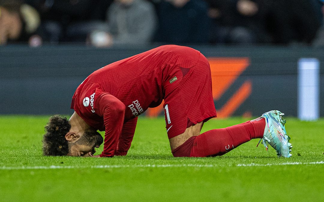 Liverpool's Mohamed Salah kneels to pray as he celebrates after scoring the second goal during the FA Premier League match between Tottenham Hotspur FC and Liverpool FC at the Tottenham Hotspur Stadium