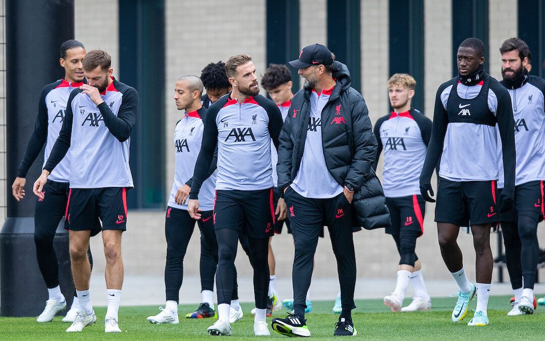 Liverpool's captain Jordan Henderson (L) and manager Jürgen Klopp (R) during a training session at the AXA Training Centre ahead of the UEFA Champions League Group A matchday 4 game between Glasgow Rangers FC and Liverpool FC