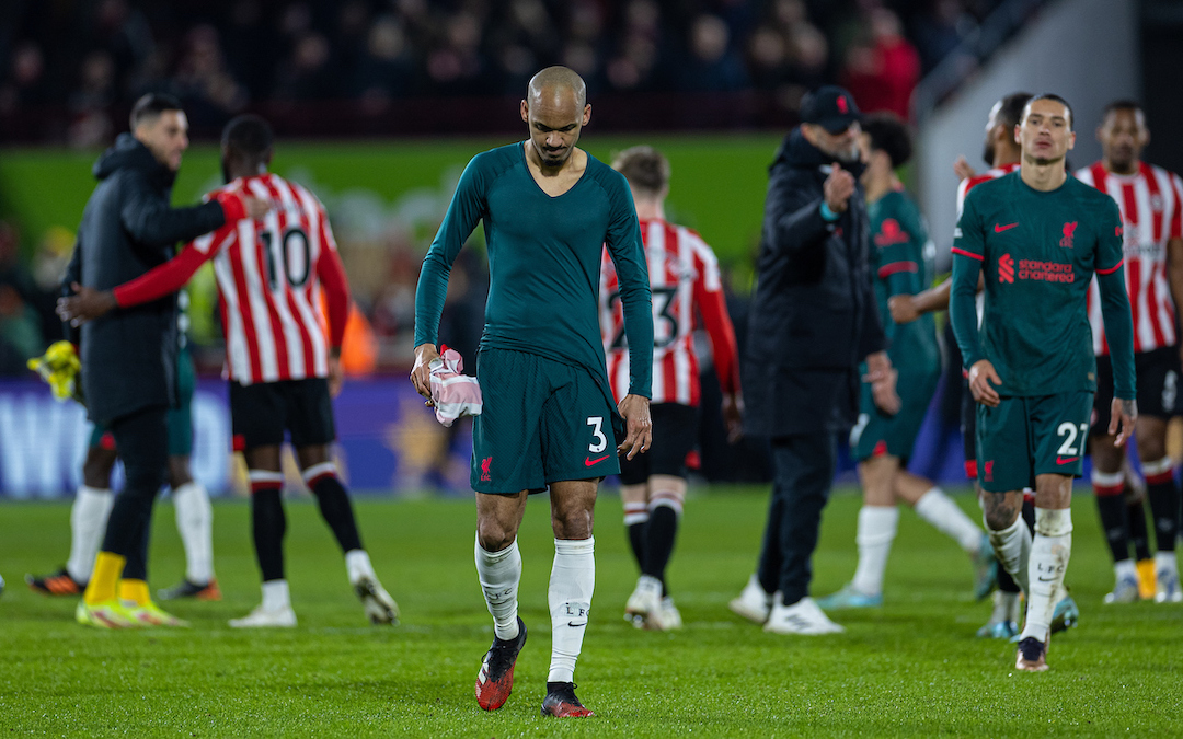 Liverpool's Fabio Henrique Tavares 'Fabinho' (L) looks dejected after the FA Premier League match between Brentford FC and Liverpool FC at the Brentford Community Stadium