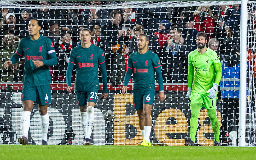 Liverpool's goalkeeper Alisson Becker looks dejected as Brentford score the opening goal during the FA Premier League match between Brentford FC and Liverpool FC at the Brentford Community Stadium