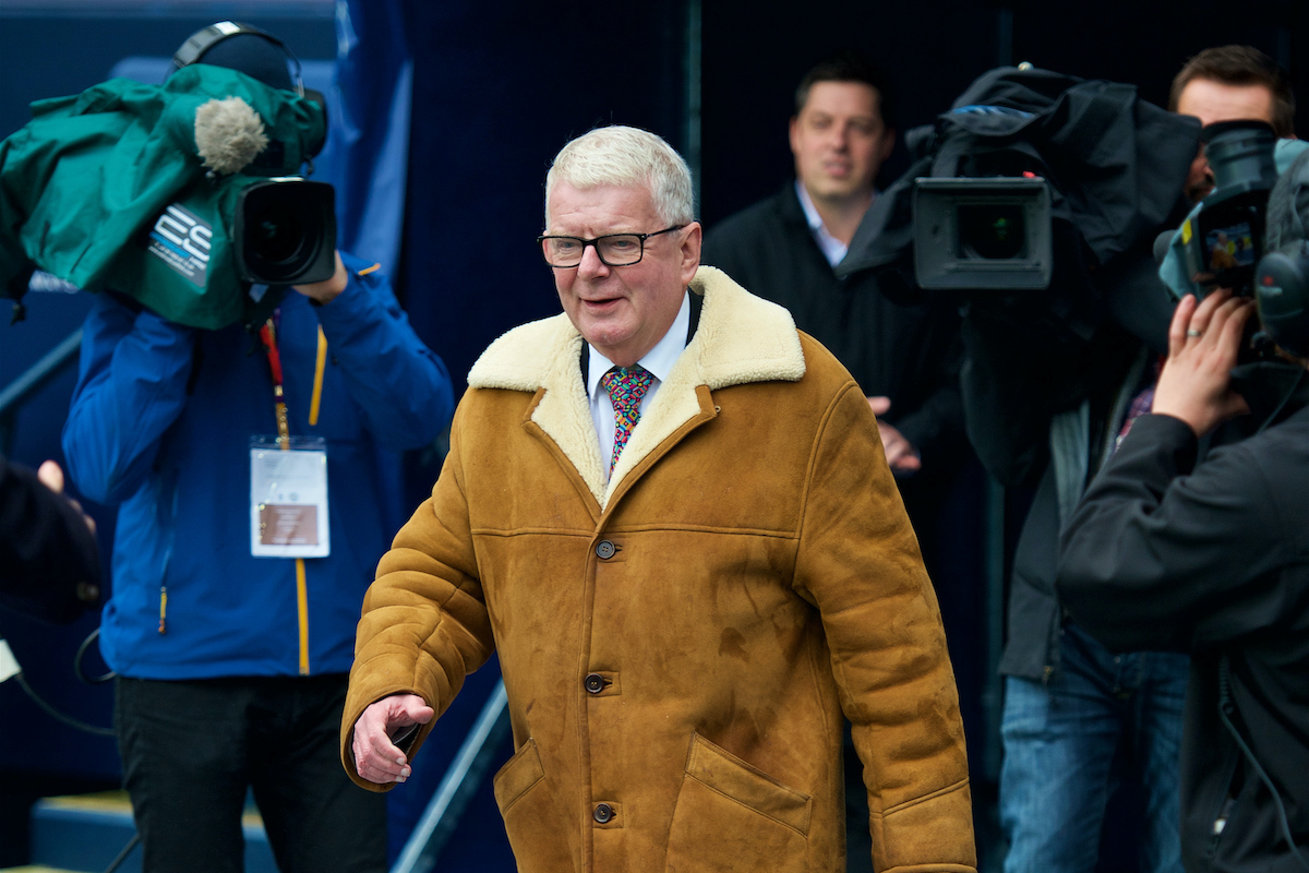 BBC commentator John Motson with a blue sheep skin coat as a memento to commemorate his last commentary before the FA Premier League match between Manchester City and Burnley at the City of Manchester Stadium