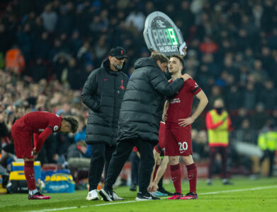 Liverpool's Diogo Jota is given instructions by assistant manager Peter Krawietz during the FA Premier League match between Liverpool FC and Everton FC, the 242nd Merseyside Derby, at Anfield