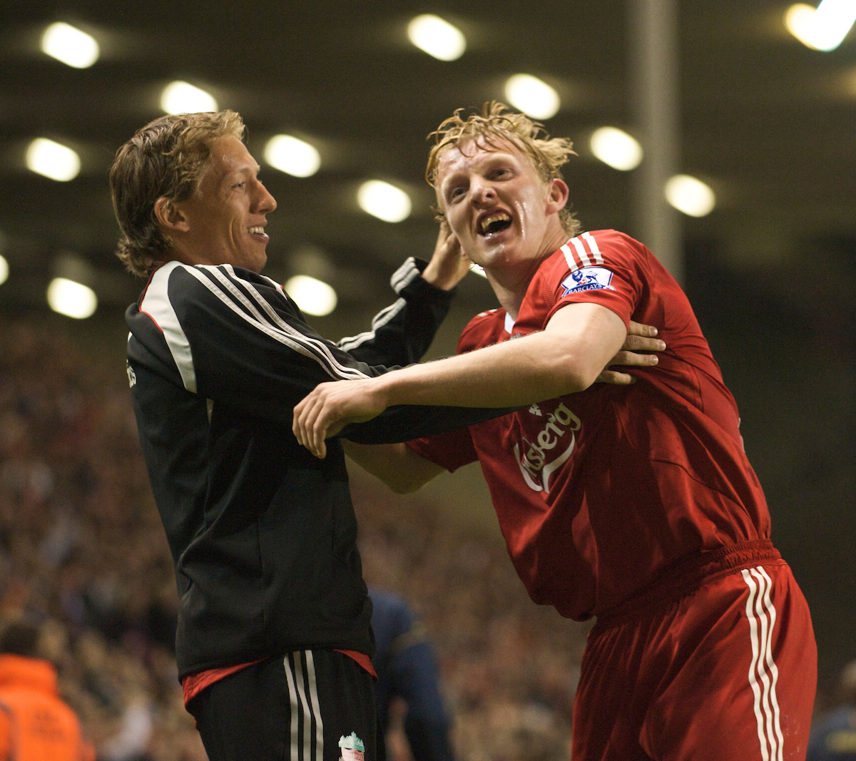 Liverpool's Dirk Kuyt celebrates Yossi Benayoun's goal to make the score 2-1 against Arsenal with team-mate Lucas Leiva during the Premiership match at Anfield