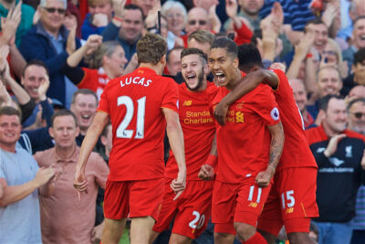 Liverpool's Roberto Firmino celebrates scoring the first goal against Leicester City with team-mates Lucas Leiva and Adam Lallana during the FA Premier League match at Anfield