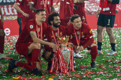 Liverpool’s Dejan Lovren, Mohamed Salah and Xherdan Shaqiri celebrate with the Premier League trophy as they are crowned Champions after the FA Premier League match between Liverpool FC and Chelsea FC at Anfield