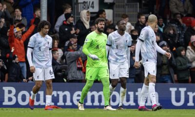 Liverpool's goalkeeper Alisson Becker (C) looks dejected as Bournemouth score the opening goal during the FA Premier League match between AFC Bournemouth and Liverpool FC at the Vitality Stadium