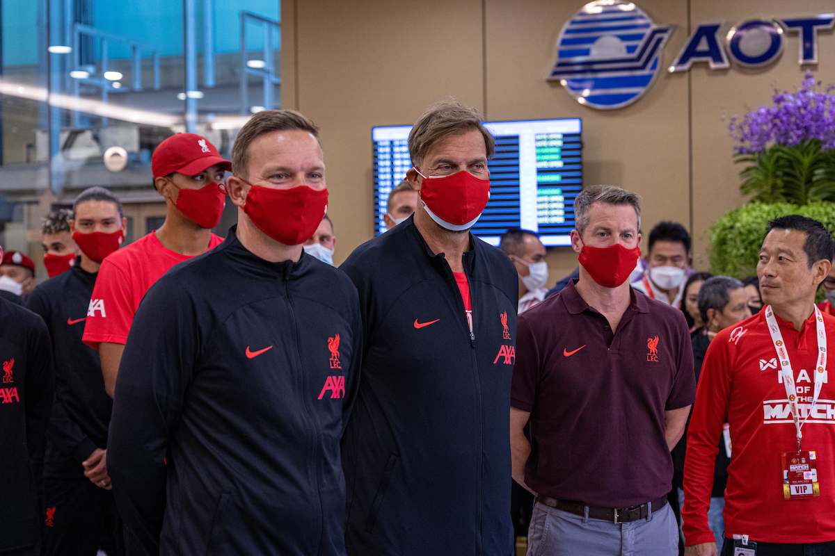 Liverpool's manager Jürgen Klopp (C) arrives with first-team development coach Pepijn Lijnders (L) and Chief Executive Officer Billy Hogan (R) at Suvarnabhumi Airport in Bangkok, Thailand ahead of their pre-season friendly match against Manchester United FC