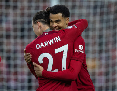 Liverpool's Cody Gakpo (R) celebrates with team-mate Darwin Núñez after scoring the third goal during the FA Premier League match between Liverpool FC and Manchester United FC at Anfield