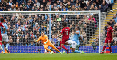 Liverpool's Mohamed Salah scores the opening goal during the FA Premier League match between Manchester City FC and Liverpool FC at the Etihad Stadium