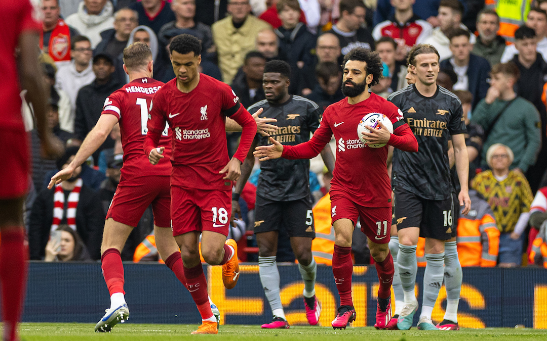 Liverpool's Mohamed Salah celebrates after scoring his side's first goal during the FA Premier League match between Liverpool FC and Arsenal FC at Anfield