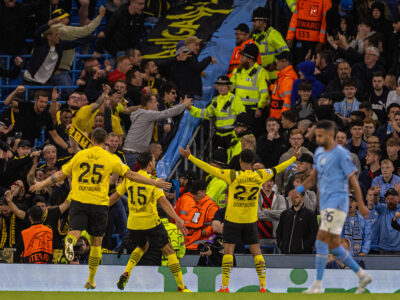Borussia Dortmund's Jude Bellingham celebrates after scoring the first goal during the UEFA Champions League Group G game between Manchester City FC and Borussia Dortmund