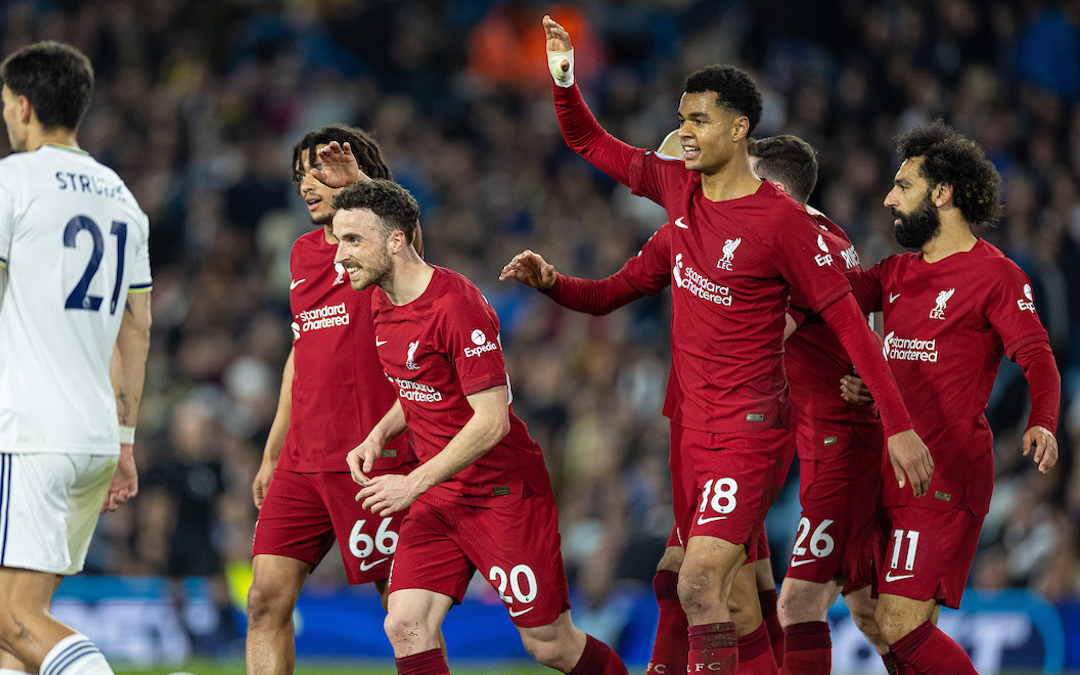 Liverpool's Diogo Jota (L) celebrates with team-mates after scoring the fifth goal during the FA Premier League match between Leeds United FC and Liverpool FC at Elland Road