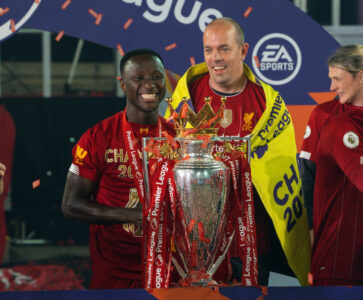 Liverpool's Naby Keita with the Premier League trophy as the Reds are crowned Champions after the FA Premier League match between Liverpool FC and Chelsea FC at Anfield