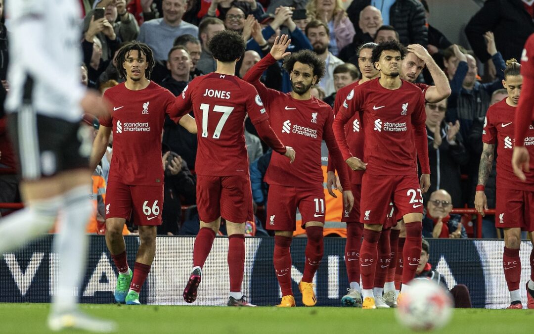 Liverpool's Mohamed Salah celebrates after scoring the opening goal from a penalty kick during the FA Premier League match between Liverpool FC and Fulham FC at Anfield