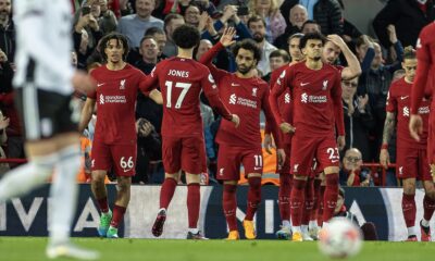 Liverpool's Mohamed Salah celebrates after scoring the opening goal from a penalty kick during the FA Premier League match between Liverpool FC and Fulham FC at Anfield