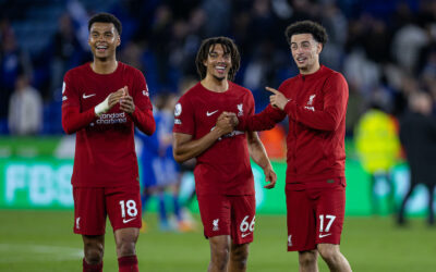Liverpool's goal-scorers Trent Alexander-Arnold (C) and Curtis Jones (R) celebrate with Cody Gakpo (L) after the FA Premier League match between Leicester City FC and Liverpool FC at the King Power Stadium