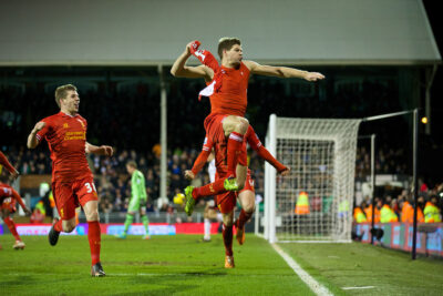 Liverpool's captain Steven Gerrard celebrates scoring the winning third goal against Fulham from the penalty spot during the Premiership match at Craven Cottage