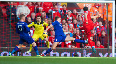 Liverpool's Luis Suarez scores the first goal against Cardiff City during the Premiership match at Anfield